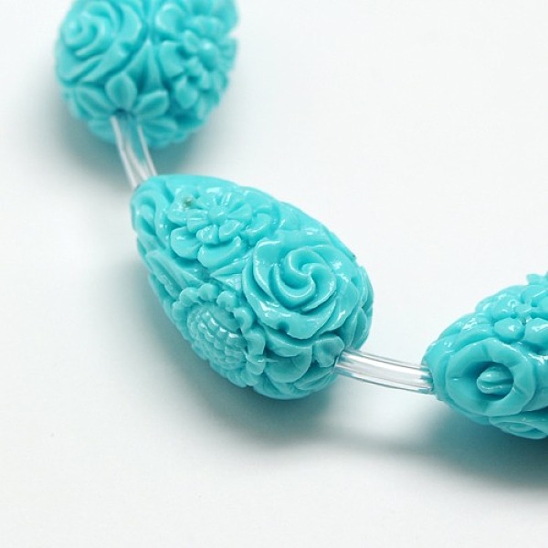 PandaHall Dyed Synthetical Coral Teardrop Shaped Carved Flower Bud Beads Strands, Cyan, 21x14x14mm, Hole: 1mm, about 16pcs/strand, 17 inch...