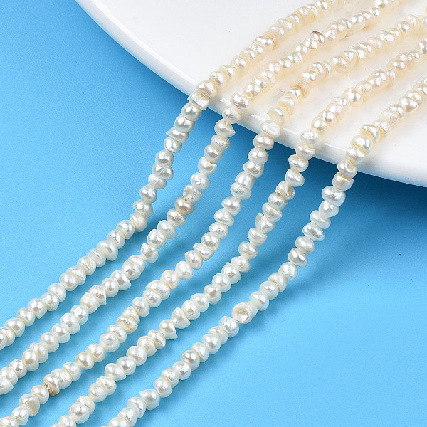 PandaHall Natural Cultured Freshwater Pearl Beads Strand, Flat Round, Seashell Color, 3~4x2.5~3mm, Hole: 0.6mm, about 148~152pcs/strand...
